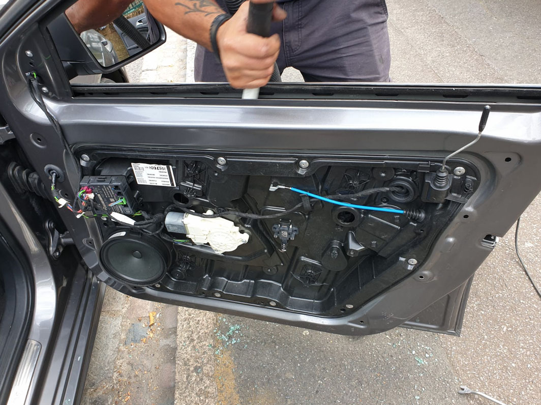 Vehicle on service ramp — side window and full glass services