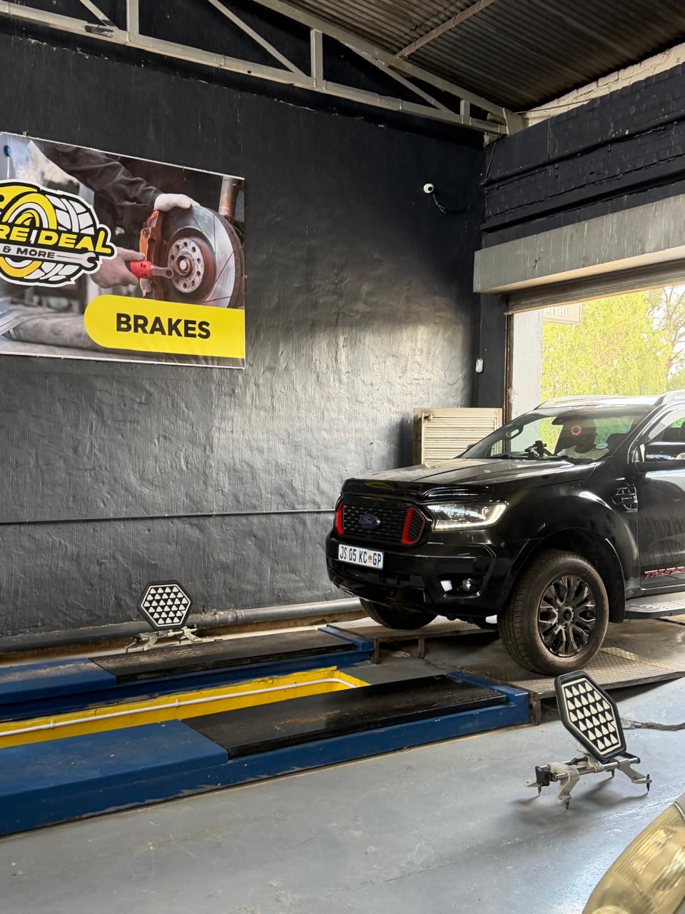 Ford Ranger on alignment bay — all vehicle types serviced